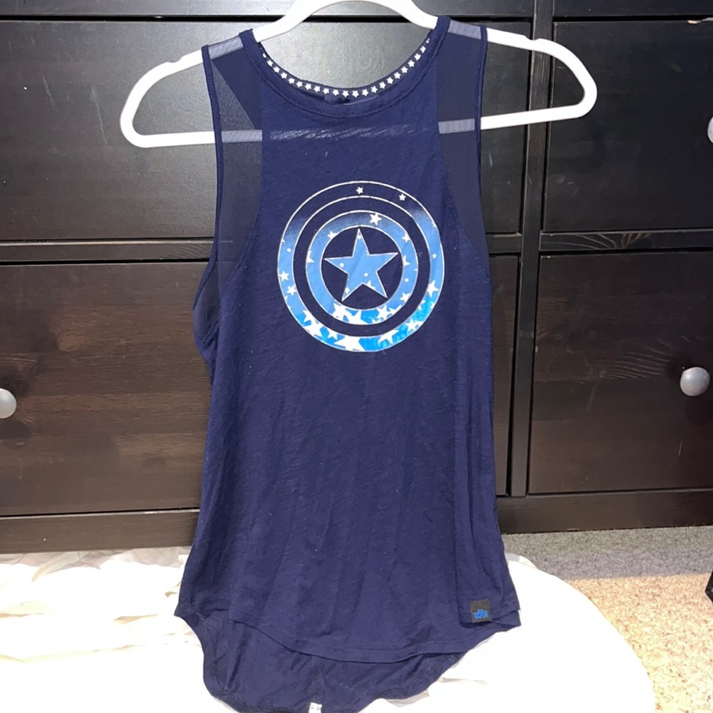 Small sports tank top, navy blue, with Captain America symbol. Never worn.